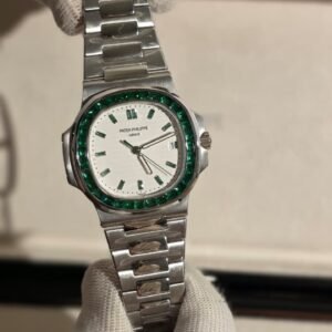 Patek Philippe Nautilus baguette Cut Emerald Bezel