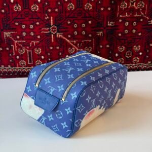 Louis Vuitton Dopp Kit crafted from Monogram Bleach coated canvas