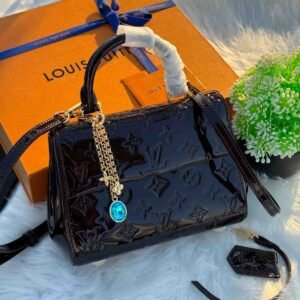 Louis Vuitton Cluny Mini in patent Monogram Empreinte